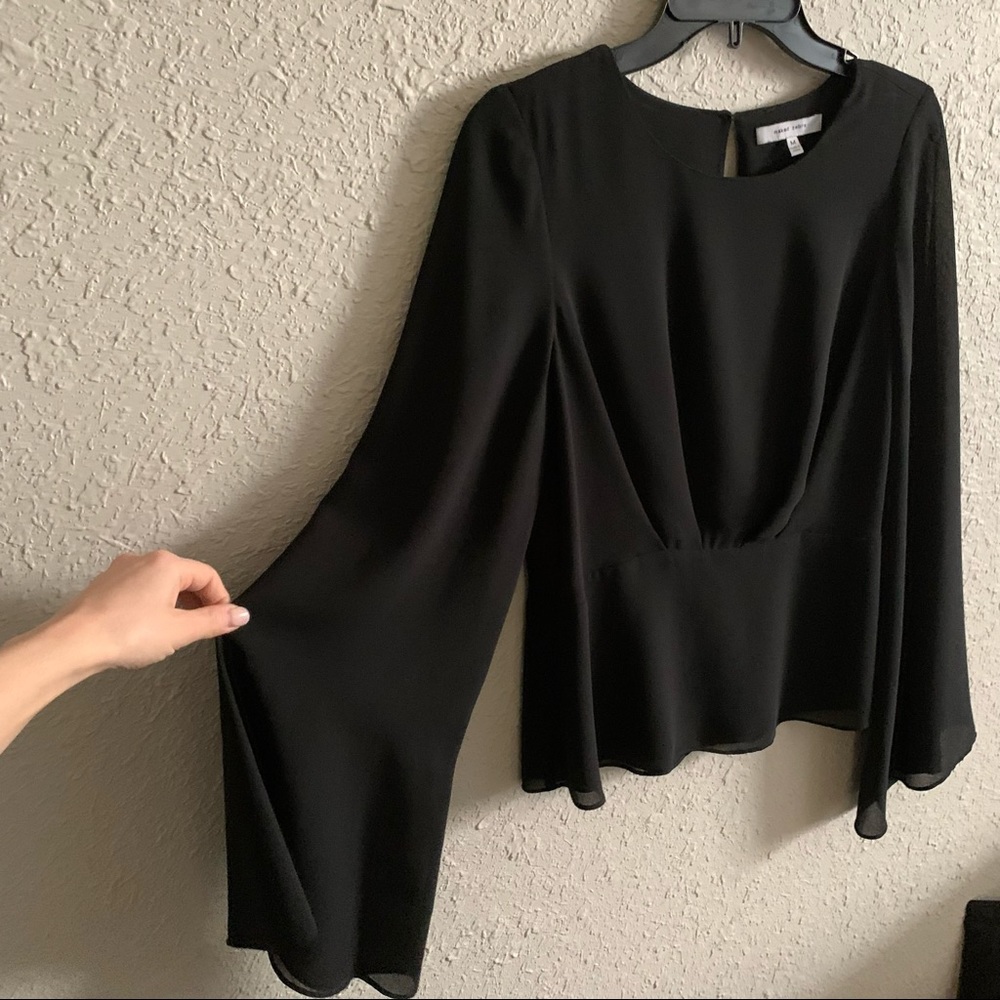 Peplum blouse with belle sleeves